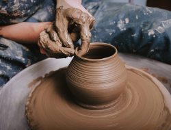 woman-hands-making-pottery